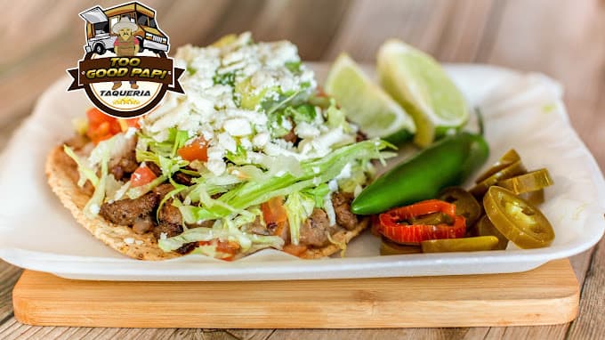 Tostada bistek with lettuce tomato queso fresco and jalapeños — Too Good Papi Taqueria Humble TX, tacos and Mexican food near me open 7 days a week