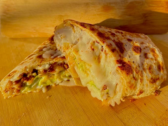 XLarge quesadilla with melted cheese at Too Good Papi Taqueria — Mexican food near me open daily until 11:30pm in Humble TX near Houston
